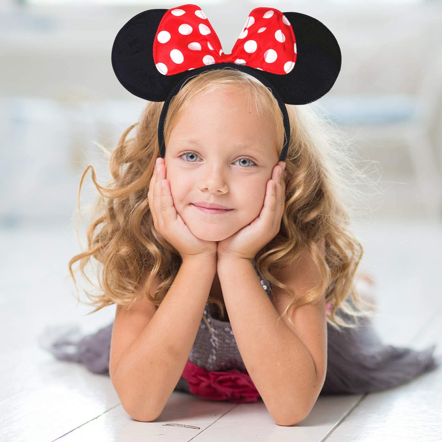 minnie-mouse-tac-fare-taci-kafa-bandi-resim-279.jpg Minnie Mouse Kırmızı Fiyonklu Kulaklı Parti Tacı - Görsel 1